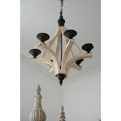 Grand residential estate entryway beautifully illuminated by a luxury farmhouse pendant light fixture.