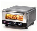 Main Product Image: ProntoCrust indoor electric pizza oven in black baking a fresh 12 inch pizza on a kitchen counter.