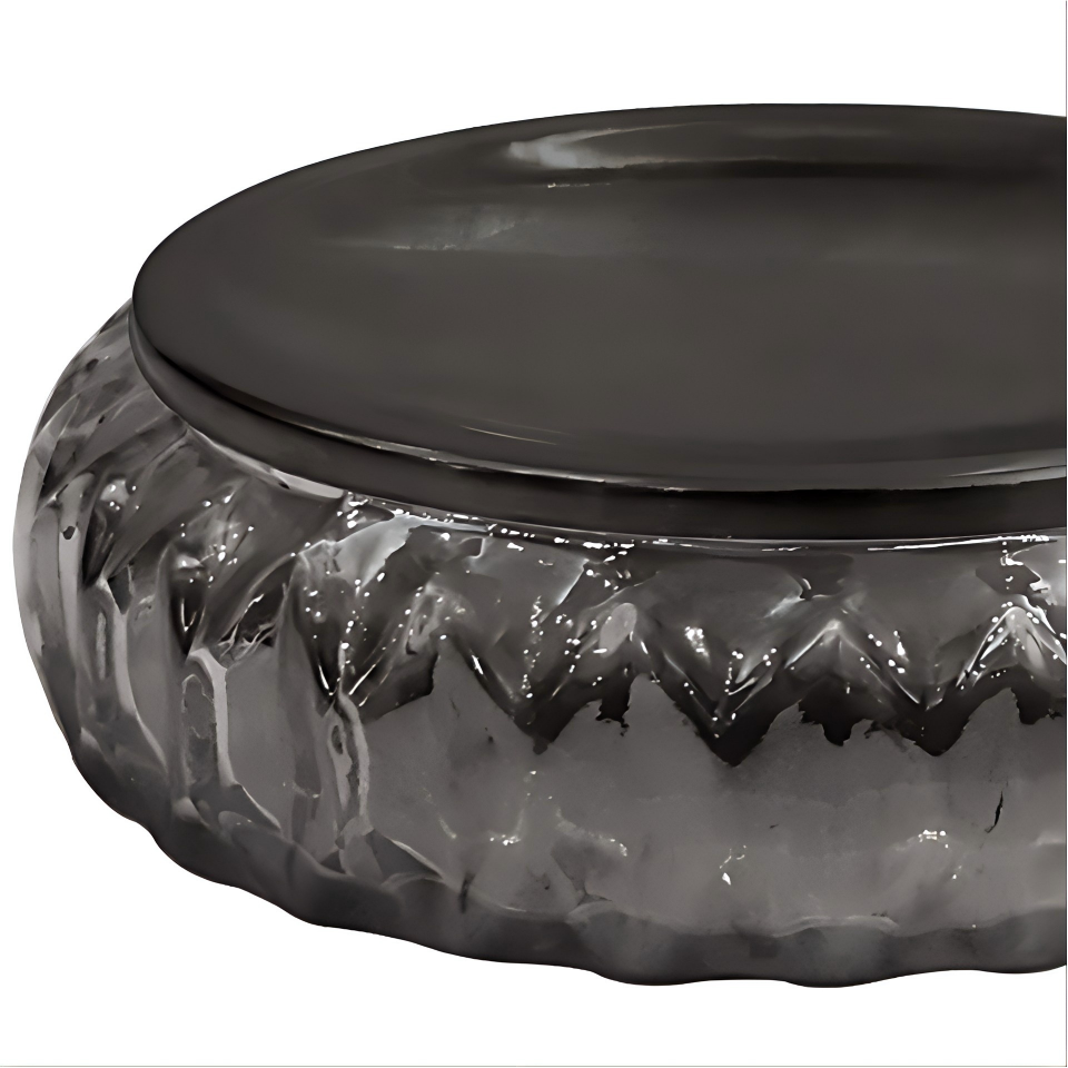 Zero slip solid point sixty five pound heavy glass soap deck next to a modern metal faucet